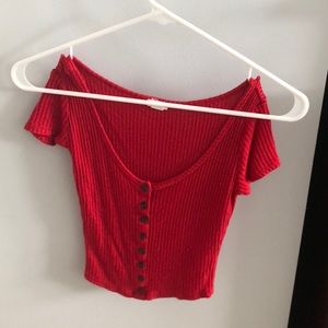 a cropped button down short sleeve shirt